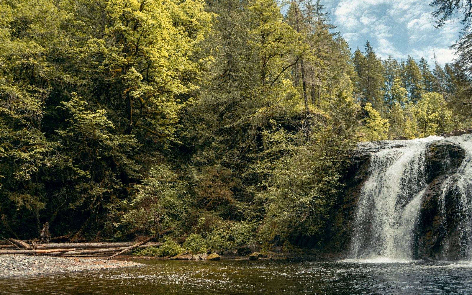 Header photo of a waterfall and nature becoming one which can be used in ways of healing.
