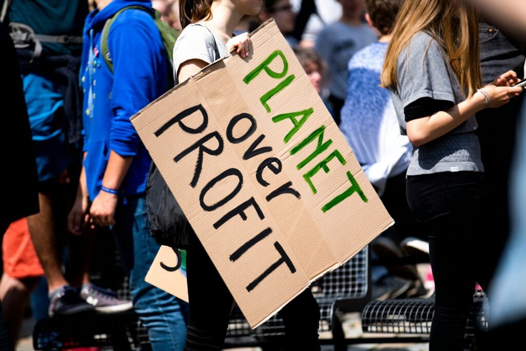 Climate Change photo saying planit over profit 
Photo: Markus Spiske