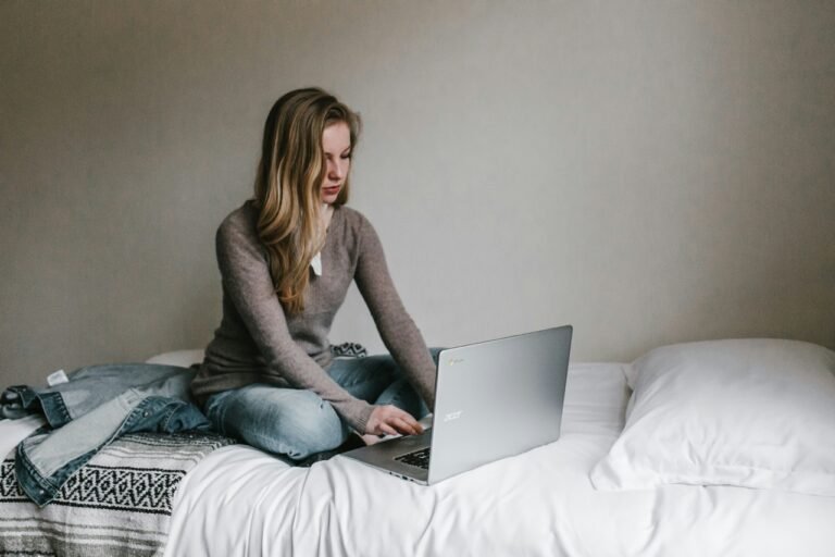 Person using an AI chatbot on a laptop