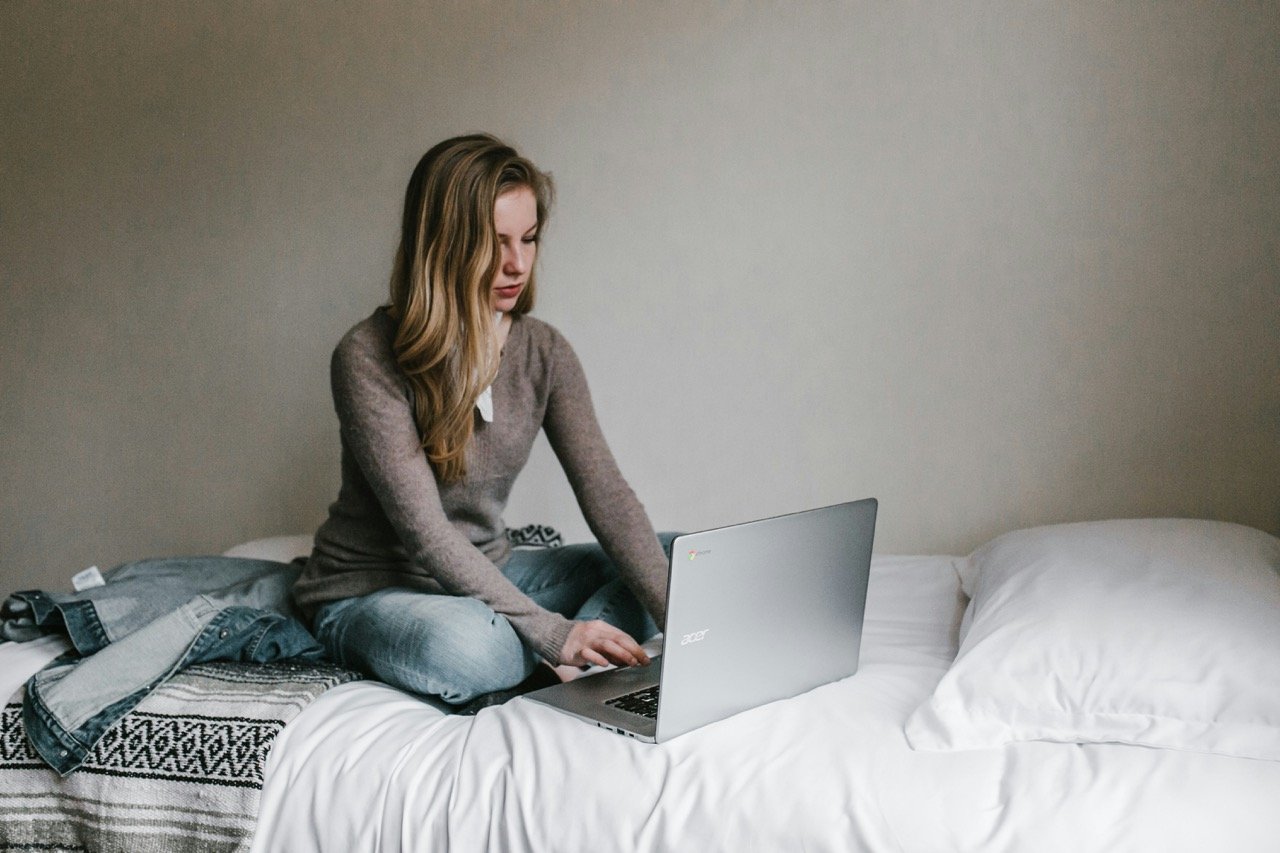 Person using an AI chatbot on a laptop