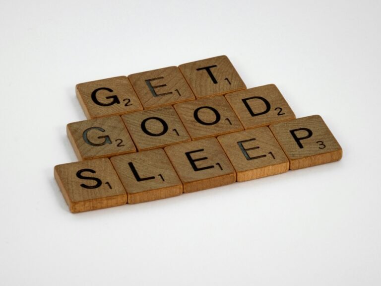 Scrabble letters spelling “GET GOOD SLEEP”