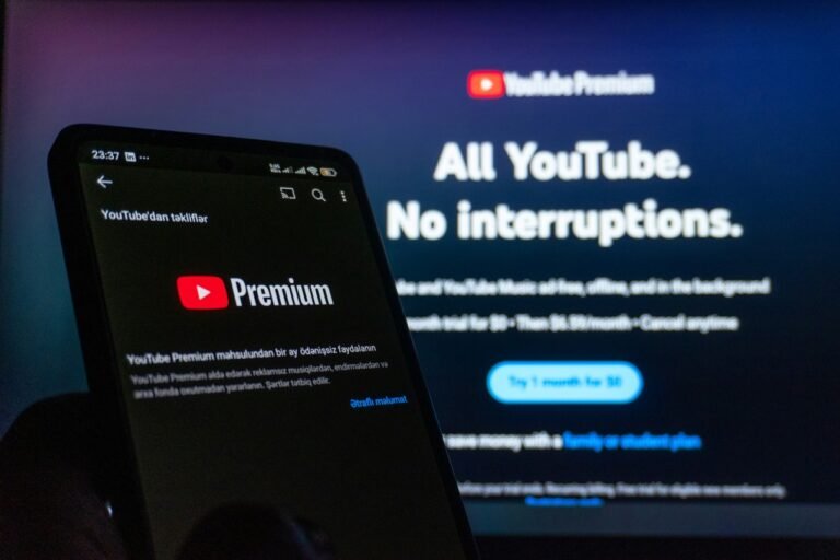 YouTube Premium subscription displayed on a smartphone and computer screen
