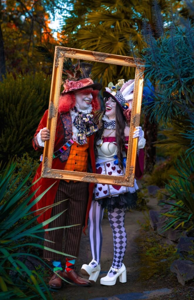 Two people dressed up like characters from Alice in Wonderland for Halloween